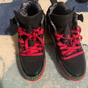 Jordan Black and Red Sneakers with Green Accents